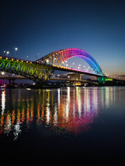Rainbow bridges begin to decorate the Mahakam River in Samarinda