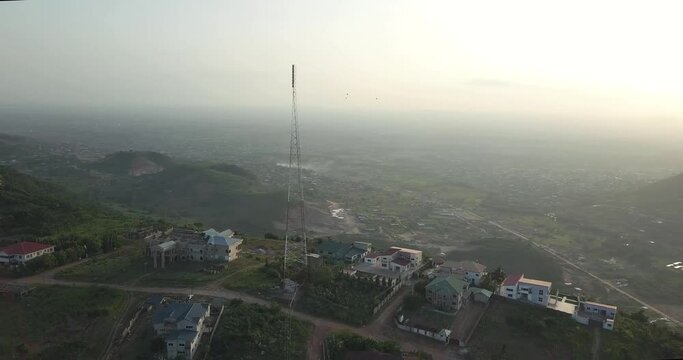 Aerial view of the foggy Berekusu hills in Accra, Ghana
