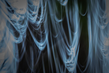 Wave abstraction. Gray blue black background. Science theme.