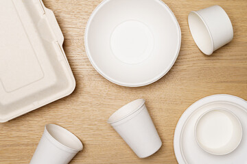 Eco friendly concept, Food container set and paper cup of biodegradable on wooden background