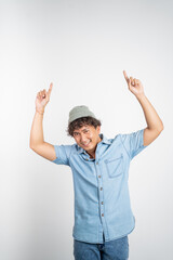 Naklejka premium happy smiling man with finger pointing up on isolated background