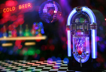 Jukebox in Bar with Disco Ball and Bokeh Composite shot © Lori Martin/Wirestock Creators