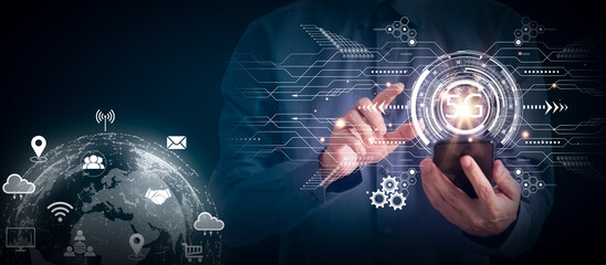 Businessman using 5G network technology connection with smartphone, system connection network wireless devices, 5G system digital hologram technology and internet of things concept