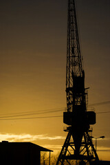 Silhouette of a black tower during sunset in Riga, Latvia