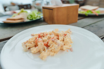 scrambled eggs on white dish,breakfast,food photography