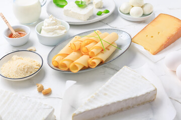 Assortment of fresh dairy products, milk, cottage cheese, eggs, yogurt