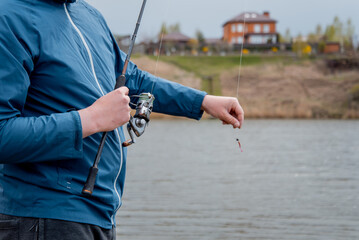 A man fishes for a predator on a silicone bait