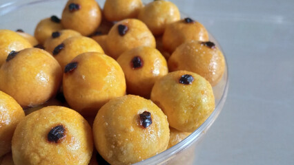 Close up view with open space of a bunch of Pineapple tart, also known as nastar, a small, bite-size tart filled with pineapple jam, commonly found throughout different parts of Southeast Asia