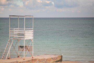white observation tower near the sea