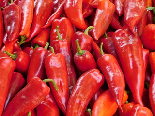 Red peppers on display on a vegetable stand