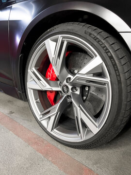 Sankt-Petersburg, Russia,May 7, 2022 : Audi RS 6 Avant exterior details. Tyre and alloy wheel. Carbon Ceramic brakes. Car exterior details
