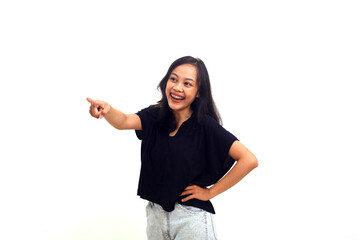 asian woman over white background Pointing with finger surprised ahead something on the front