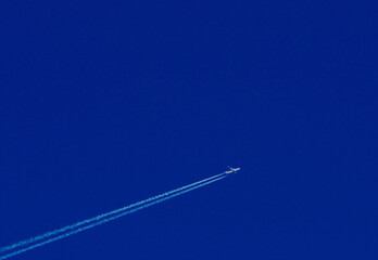 jet airplane on blue sky.