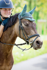 Reiterin mit Pferd