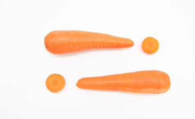 fresh Carrot slice over on white background, top view