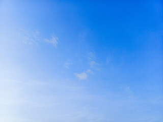 Naklejka na ściany i meble Blue sky with transparent clouds background
