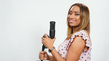 A woman voiceover with a microphone