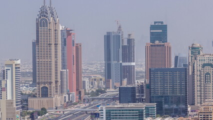 Naklejka premium Aerial view of Dubai Internet City area timelapse