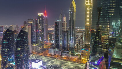 Financial center of Dubai city with luxury skyscrapers day to night timelapse, Dubai, United Arab Emirates