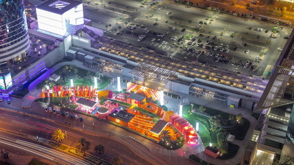 Gate Avenue new promenade aerial night timelapse, located in Dubai international financial center.
