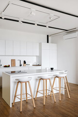Stylish kitchen interior design with white furniture