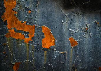 Cracked paint texture. Grunge wall texture. Dark wall with old paint
