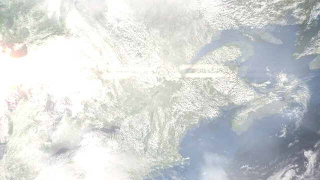 Earth zoom in from outer space to city. Zooming on Trois Rivieres, Quebec, Canada. The animation continues by zoom out through clouds and atmosphere into space. Images from NASA