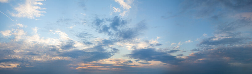 Naklejka na ściany i meble Skyline background with clouds, sky and sun light. Sunset sky