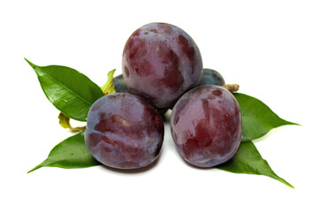 Organic plums isolated on white background