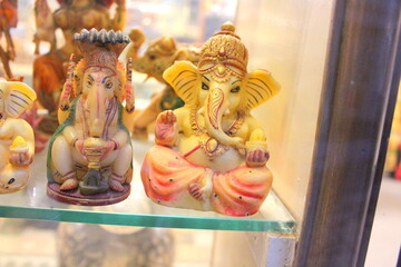 Fototapeta premium Lord Ganesha idol in white marble for sale