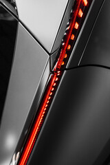 modern matte metal texture with curved shapes and red details