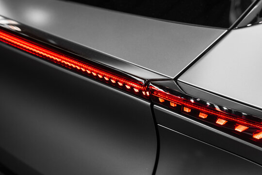 modern matte metal texture with curved shapes and red details