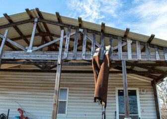 Naklejka premium Drying wader boots from the rafters