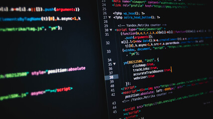 Background with a programming php html code on a dark black screen