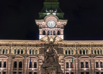 Piazza Unità d'Italia, Trieste night photo of the town hall, in front of the monumental fountain of the Four Continents, built between 1751 and 1754 by the Sculptor Giovanni Battista Mazzoleni.