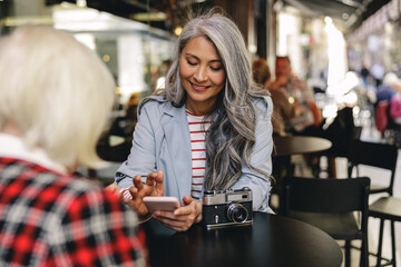 Urban women during coffee time in cafe