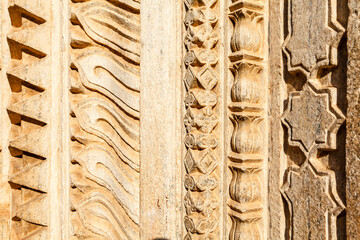 Detail of the stone carved walls of the Bundi palace in Rajasthan, India, Asia