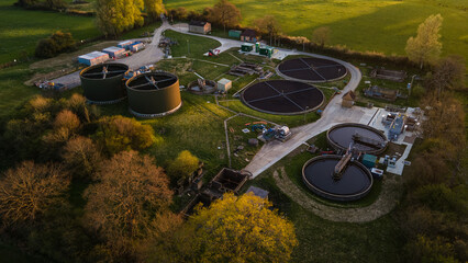 Aerial view of water treatment station on sunny evening by Henfield, West Sussex, UK