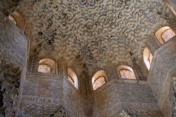 Ornamental ceiling and walls in Nasrid Palaces in the Alhambra palace Granada, Andalusia, Spain