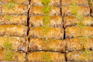 Turkish or arabic sweet dessert, baklava made from filo pastry, filled with chopped nuts and...