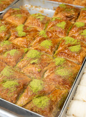 Turkish or arabic sweet dessert, baklava made from filo pastry, filled with chopped nuts and...