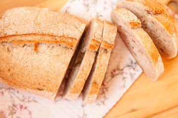 Fresh wholegrain bread on the table, top view