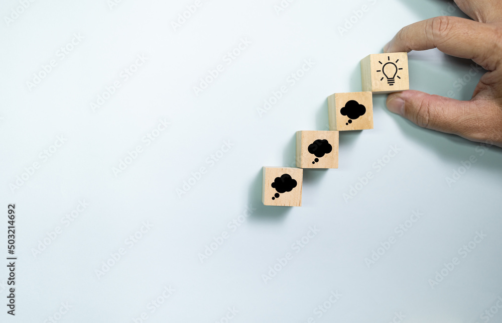 Poster Top view wooden blocks set to step from thinking to idea. Concept for creative and design thinking.