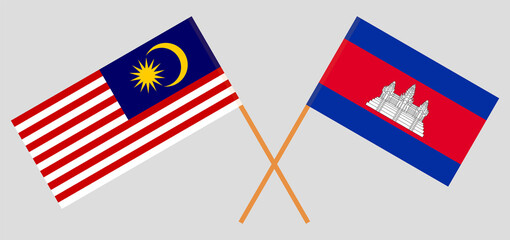 Crossed flags of Malaysia and Cambodia. Official colors. Correct proportion