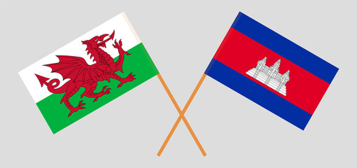 Crossed flags of Wales and Cambodia. Official colors. Correct proportion