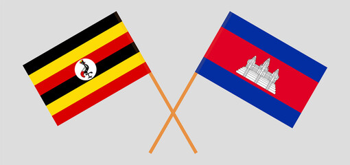 Crossed flags of Uganda and Cambodia. Official colors. Correct proportion