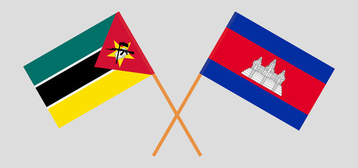 Crossed flags of Mozambique and Cambodia. Official colors. Correct proportion