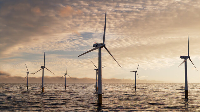 Wind Power. Offshore Wind Turbines at Sunset. Sustainable Power Concept.