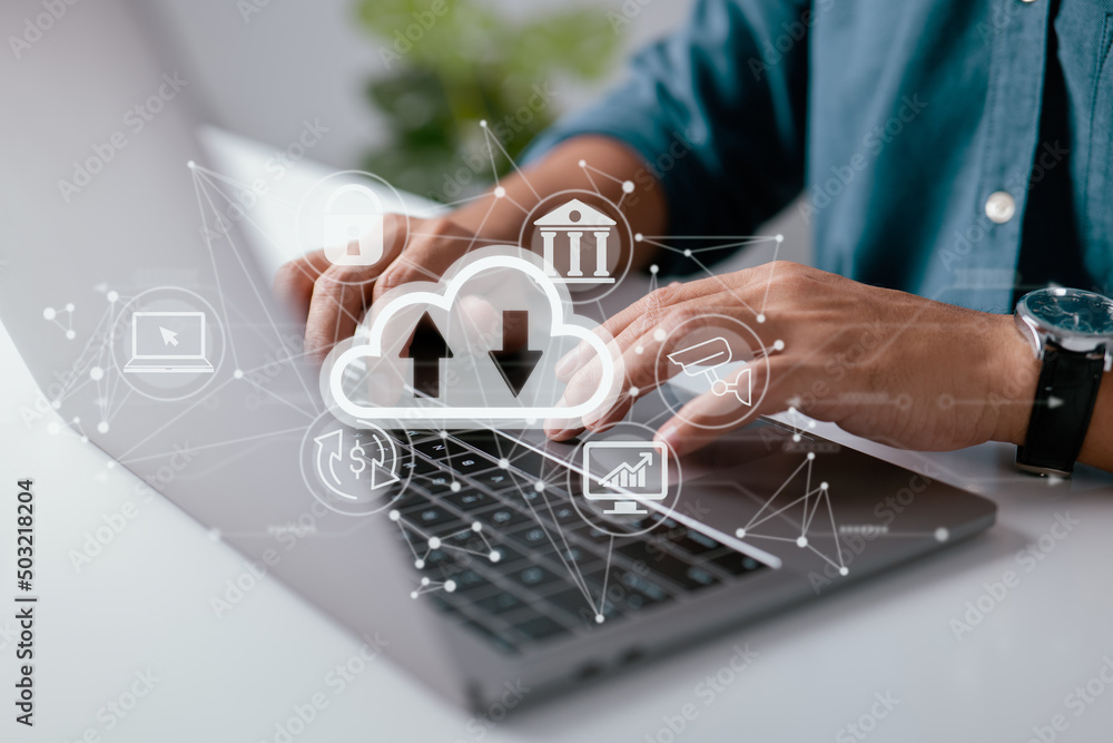 Poster A man uses a laptop with a cloud computing diagram shown on hand. Cloud technology Data storage networking and internet service concepts.