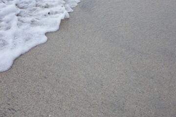 Soft blue ocean wave on the beach and soft wave background.